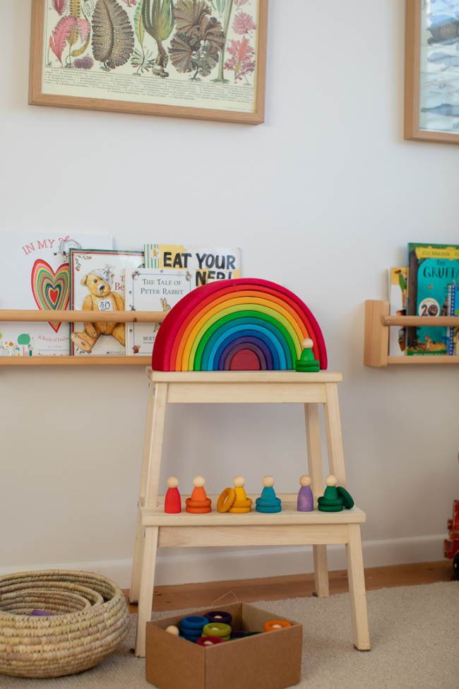 childs bedroom with grimns wooden toys on a small stepstool